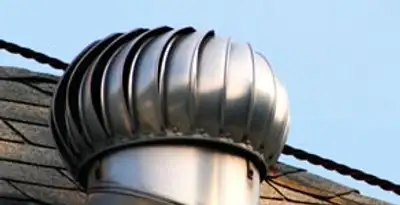 attic fan installation services with professionally installed roof ventilation unit in Aurora, CO
