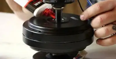 Ceiling fan motor repair and internal component adjustment in Aurora, CO