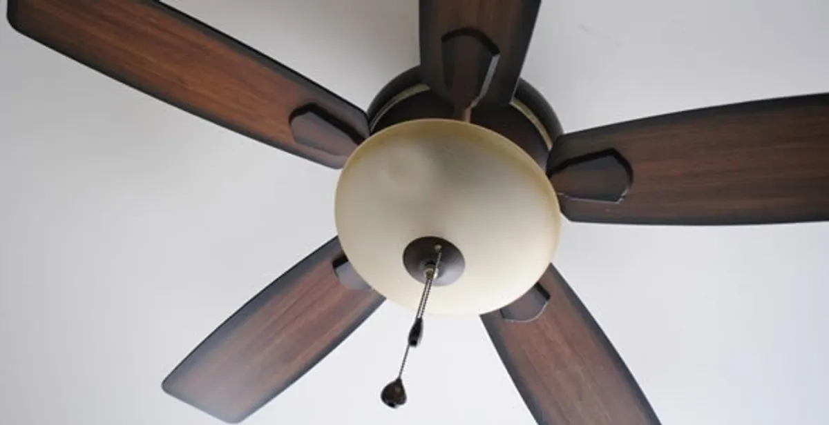 Fully installed ceiling fan with balanced blades and light fixture in Aurora, CO