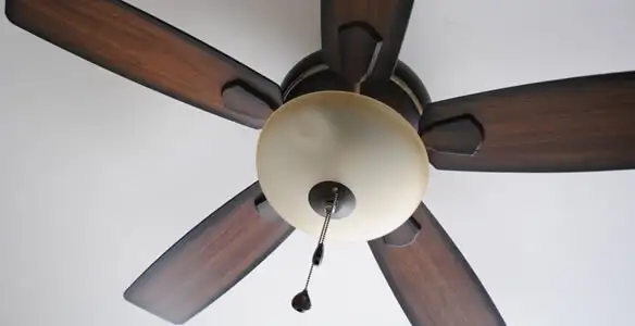 Fully installed ceiling fan with balanced blades and light fixture in Aurora, CO