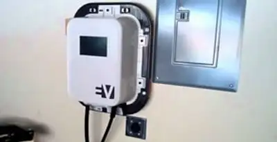 Electric car charger installation with wall-mounted EV charging station in Aurora, CO
