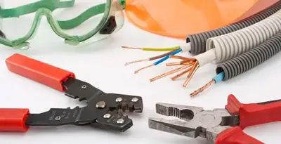 Electrical wiring repair with professional tools and safety equipment in Englewood, CO