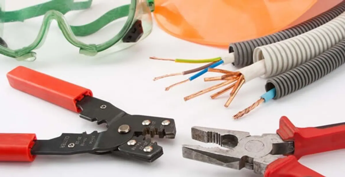 Electrical wiring repair with professional tools and safety equipment in Littleton, CO