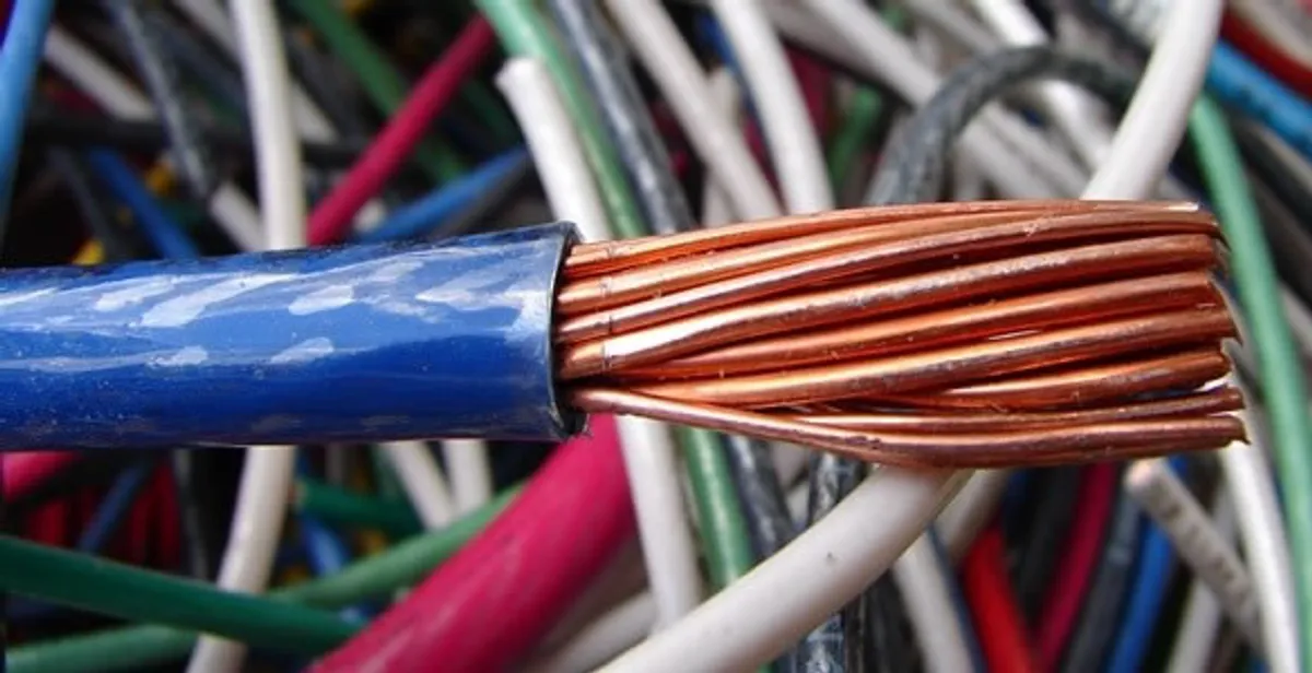 electrical wiring services showing exposed copper conductors and cable preparation in Aurora, CO