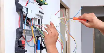 electrician services performing residential electrical panel wiring in Aurora, CO