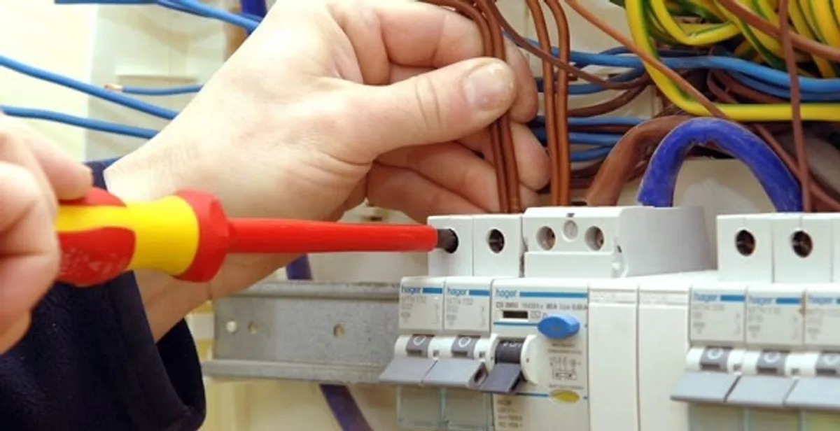 electrician services performing professional electrical panel wiring and connections in Aurora, CO