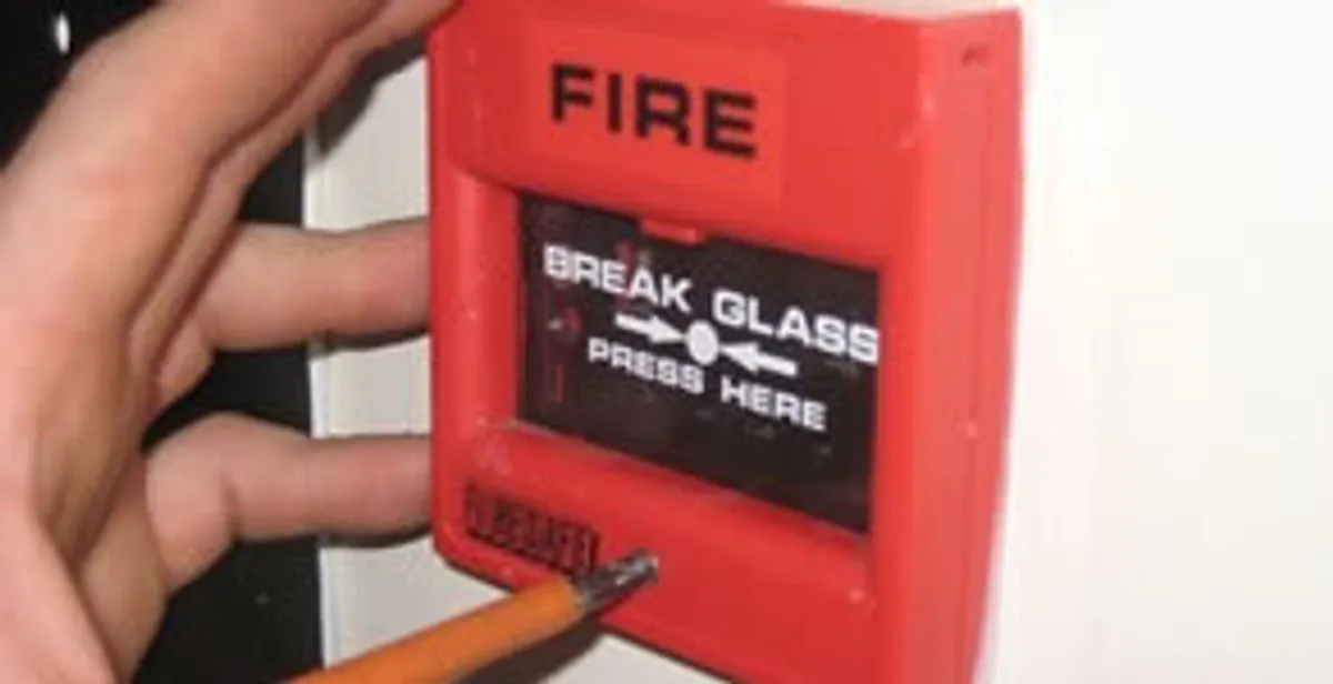 fire alarm installation service showing manual fire alarm pull station installed by licensed electricians in Aurora, CO