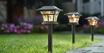 landscape lighting installation services with professionally installed pathway lights in Aurora, CO