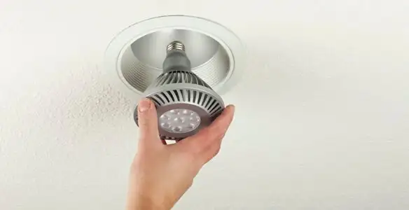 lighting installation service featuring recessed ceiling light installed by licensed professionals in Aurora, CO