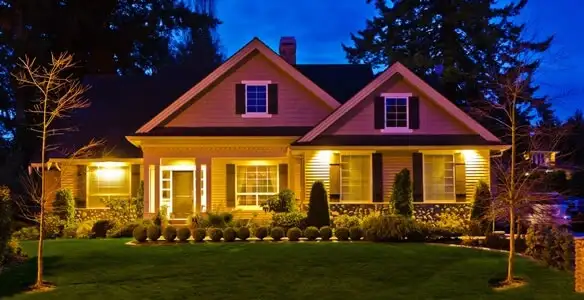 security light installation services illuminating a residential exterior at night in Aurora, CO